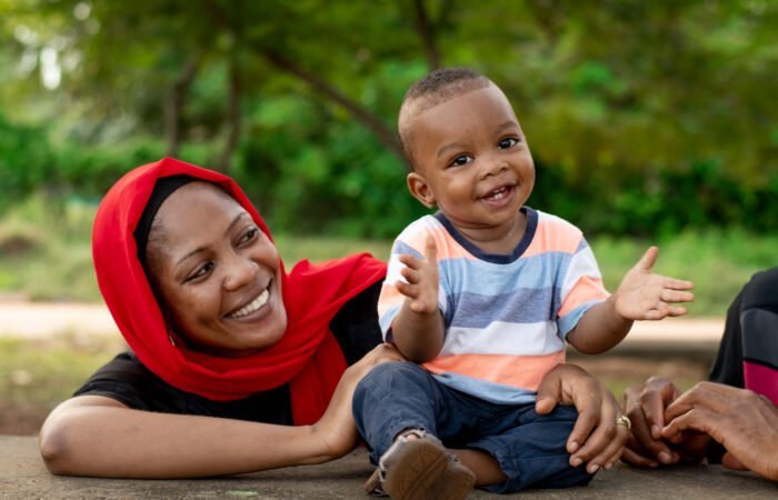 woman spending time with her black baby boy